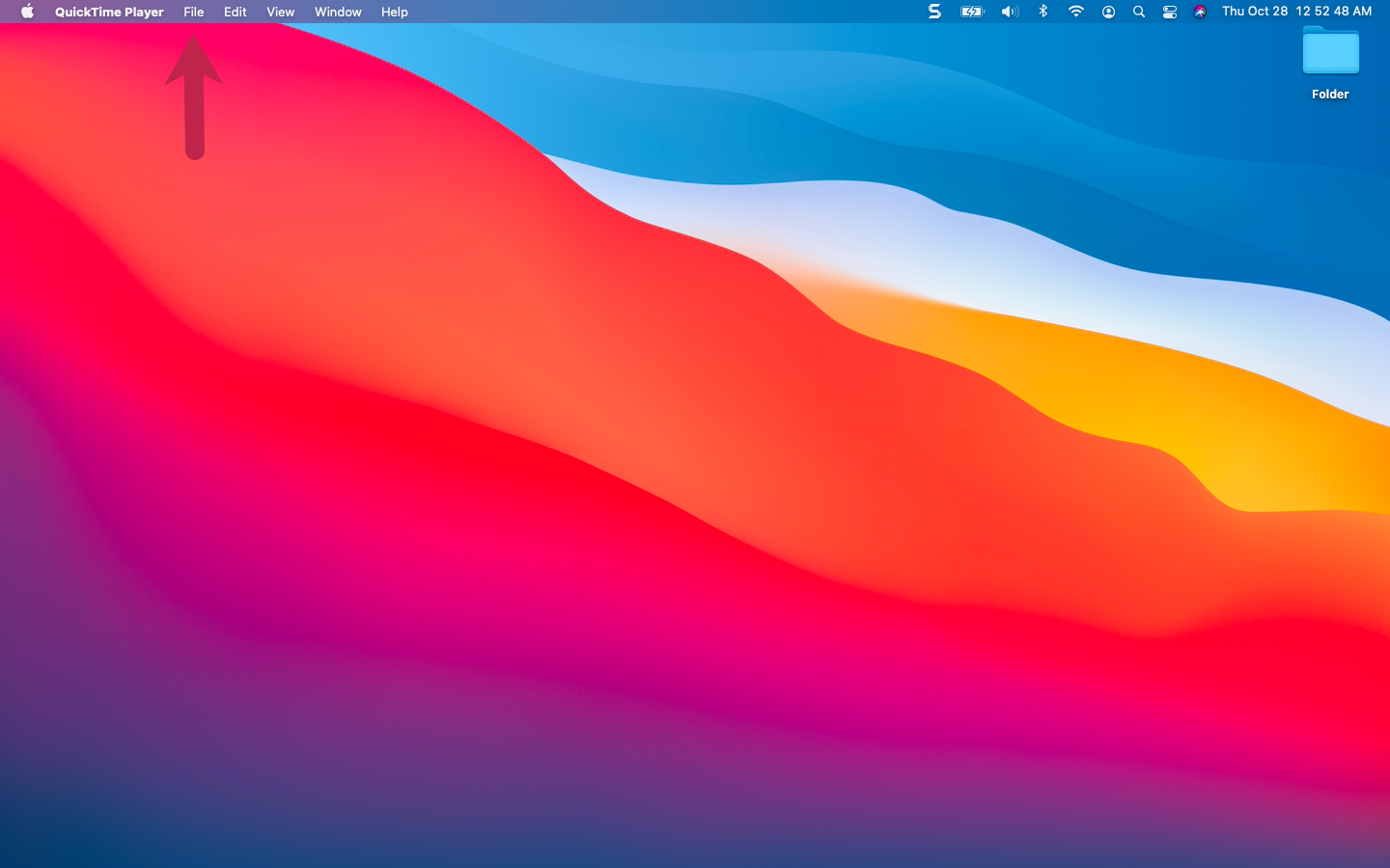 Hover-your-cursor-near-the-top-of-the-desktop-screen,-and-select-